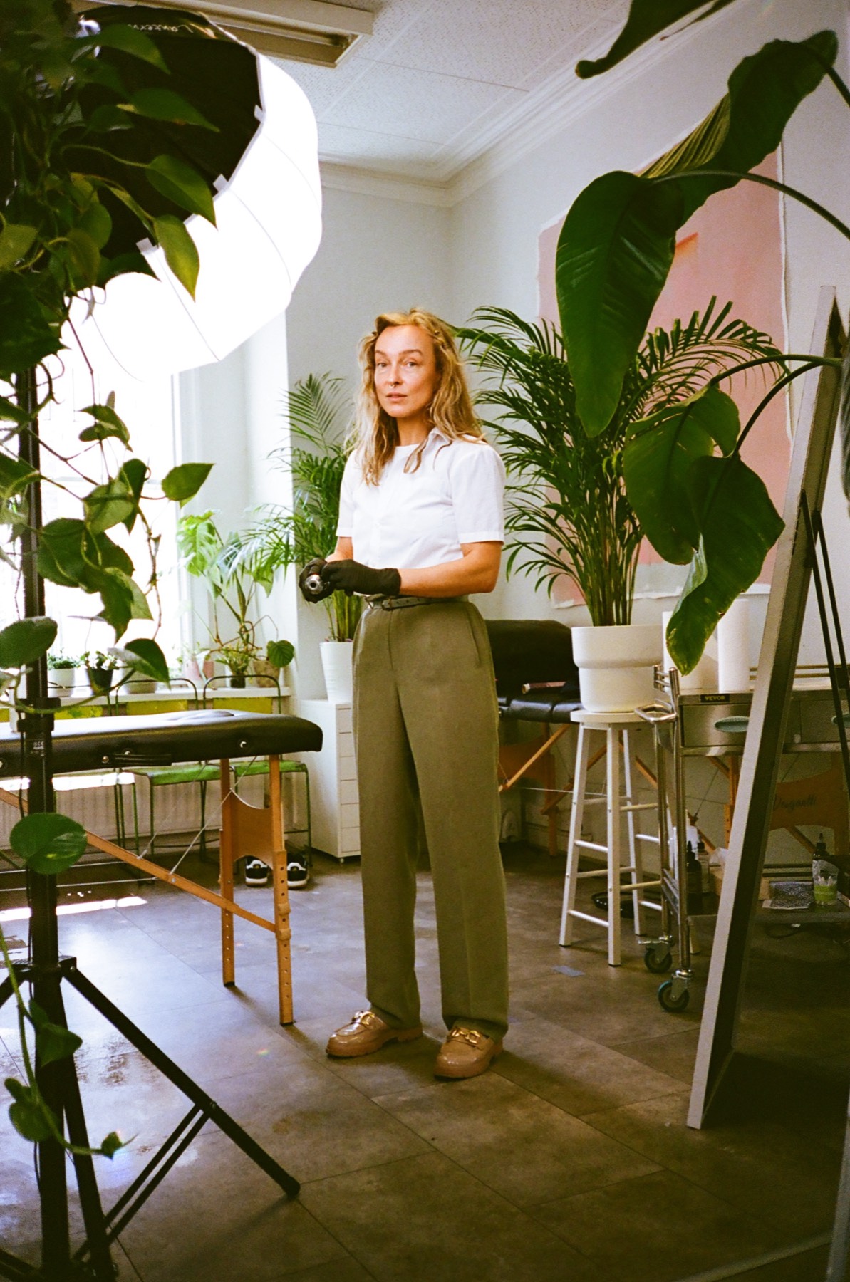 Gosia, botanical tattoo artist, in her plant-filled studio in Clifton, Bristol